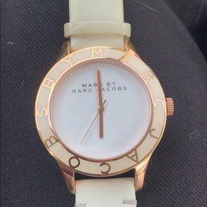 Marc Jacobs rose gold, white leather watch.